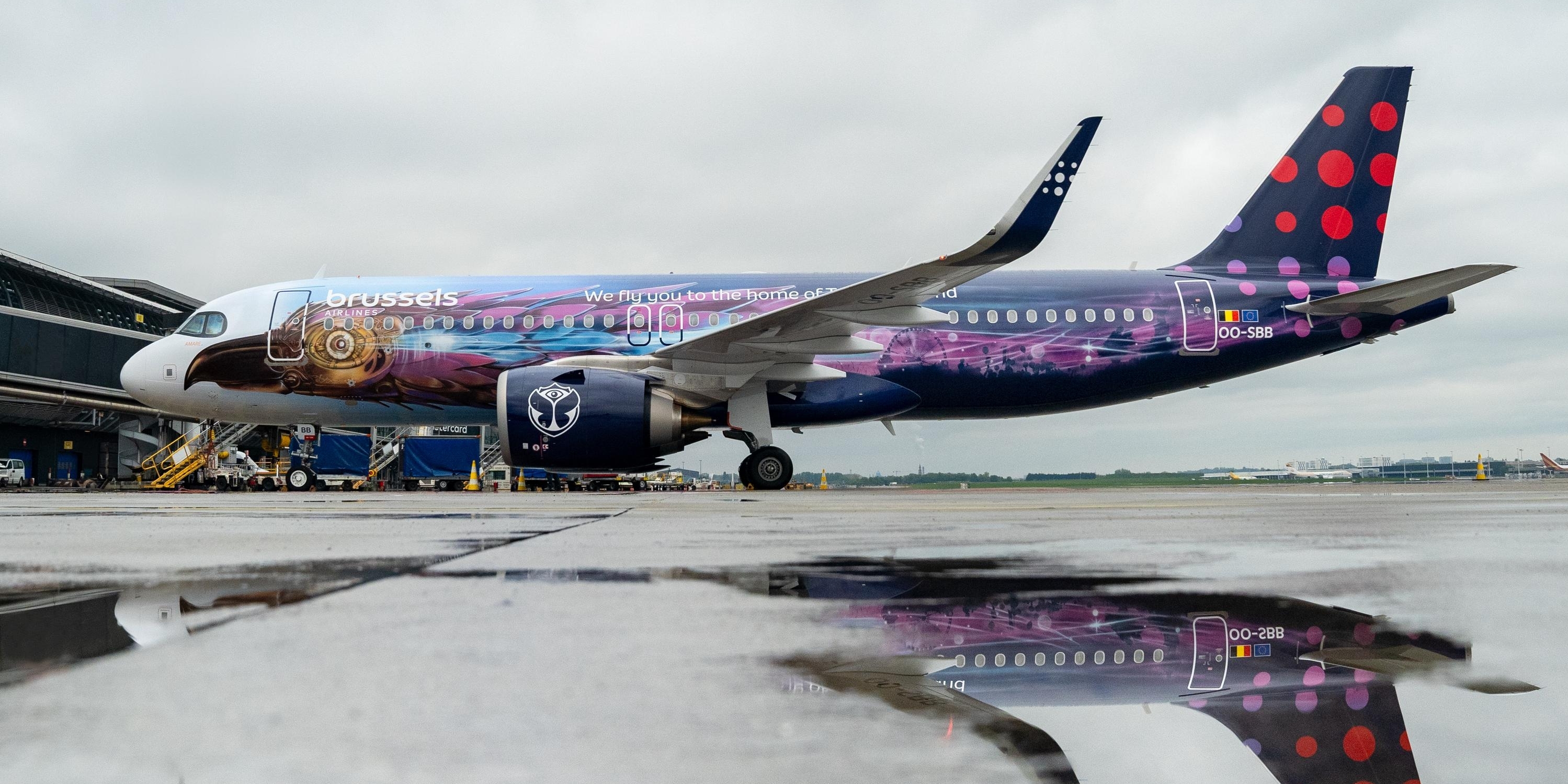Brussels Airlines Amare plane parked on wet tarmac