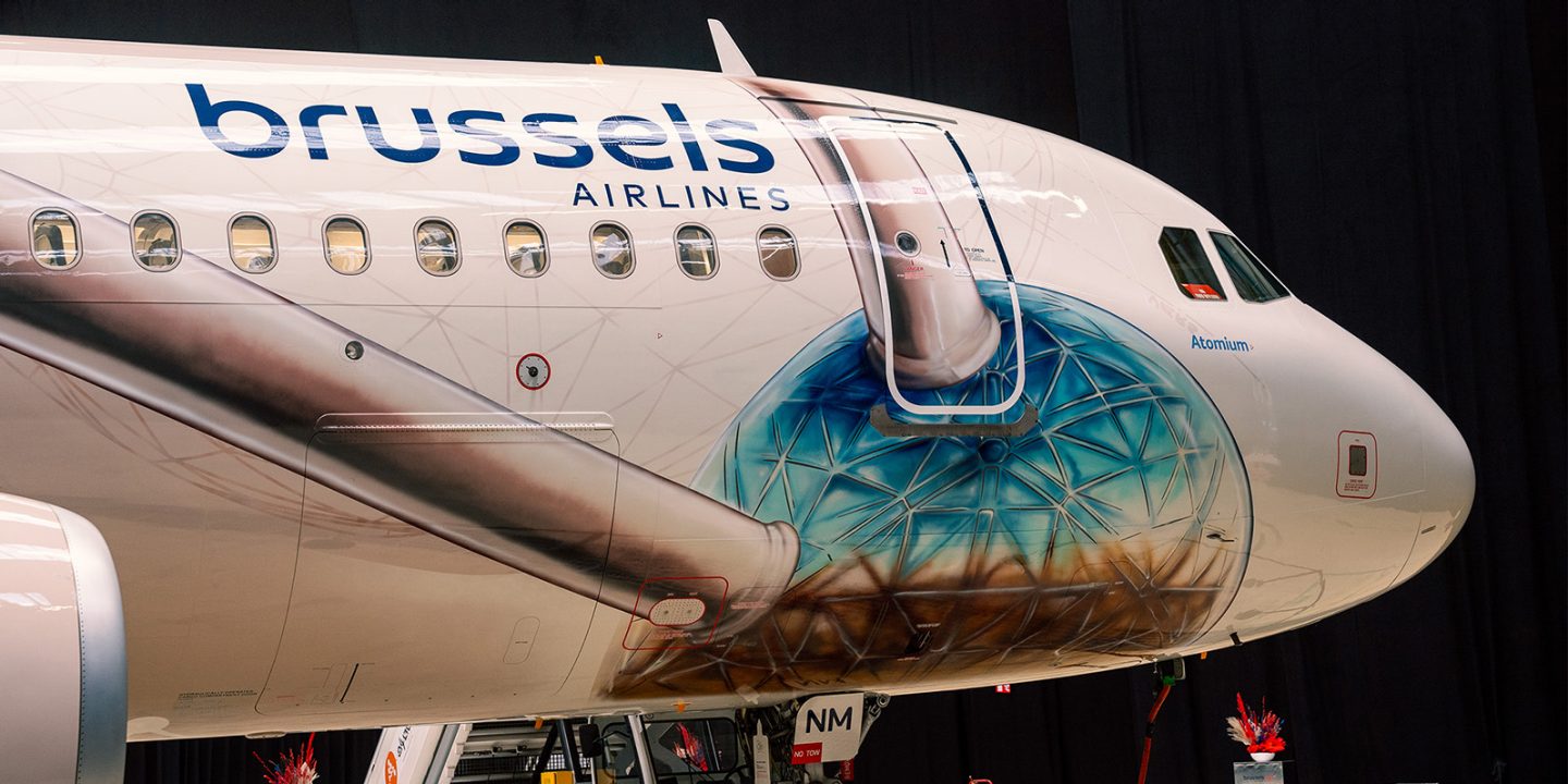 Front of a Brussels Airlines airplane displaying an Atomium design.